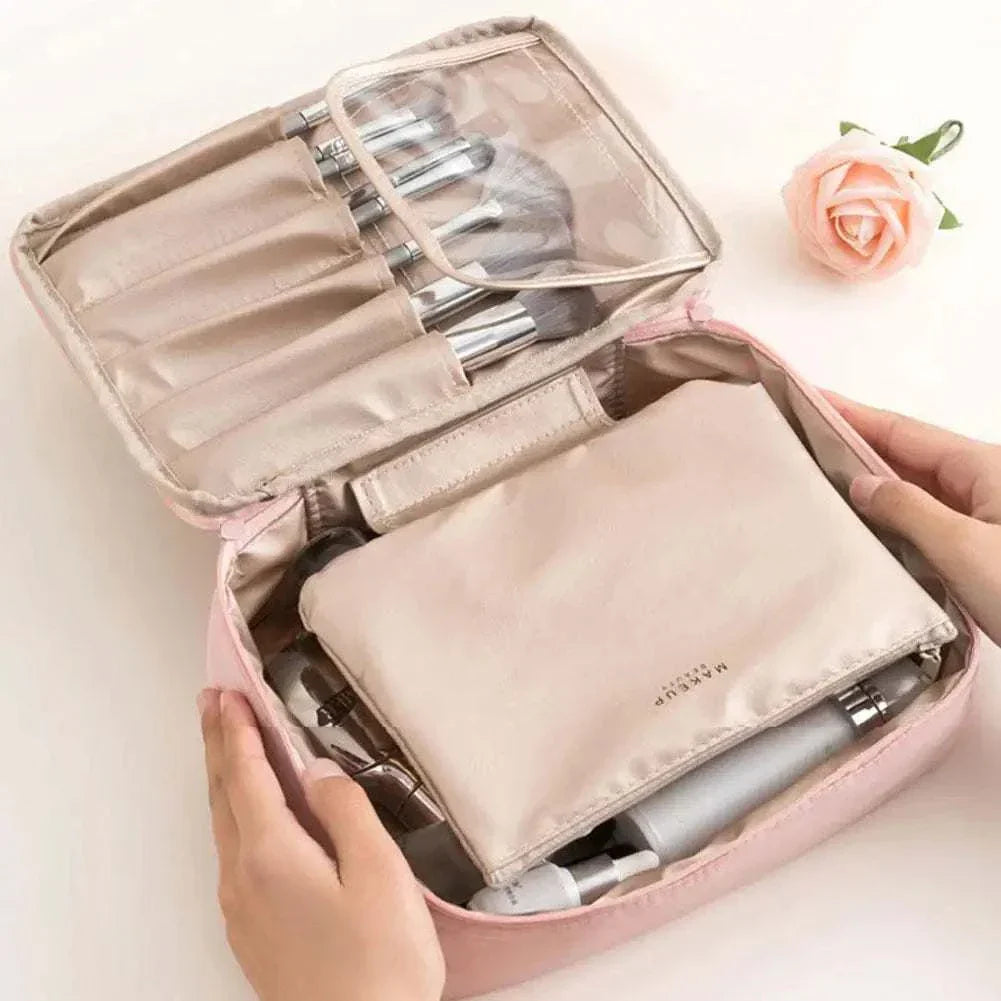 Portable cosmetic bag for toiletries, waterproof, female makeup storage, high capacity.