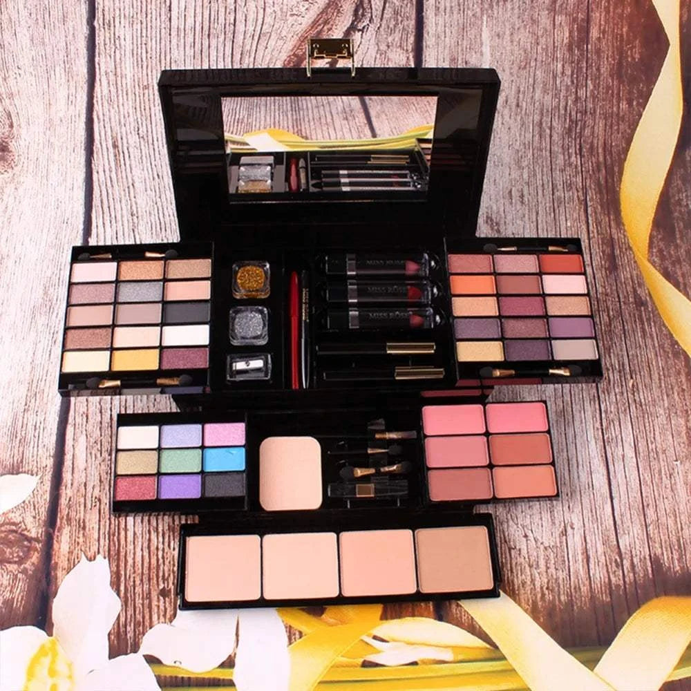 MISS ROSE professional makeup set with eyeshadow, lip gloss, foundation, blush, and powder displayed in an open box.