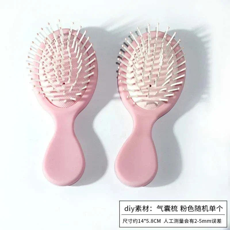 Portable pink comb mirror accessory for DIY makeup materials.