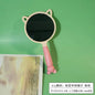 Portable pink handle comb mirror with a round shape for DIY makeup and accessories.