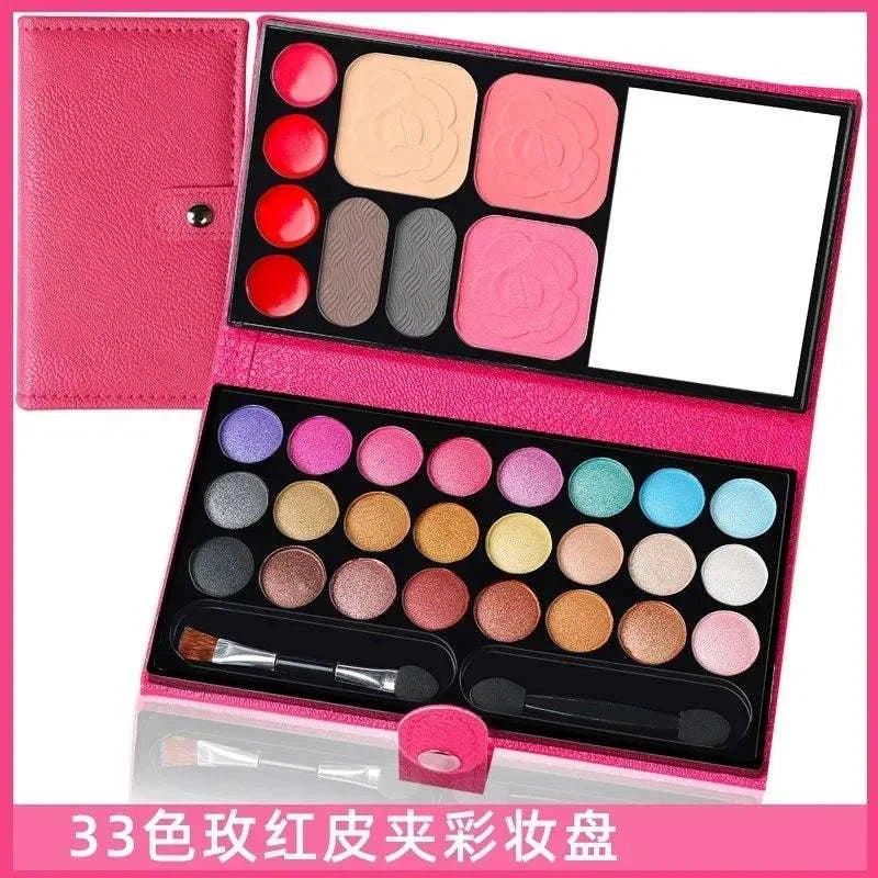 33 colors makeup set palette with eyeshadow, blush, lipstick, and mirror in pink case.