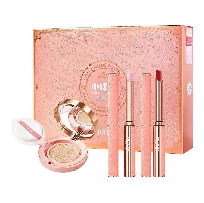 Professional makeup set with lip gloss, eyeshadow palette, and nude powder.