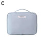 Waterproof portable cosmetic bag in light blue for toiletries and makeup storage.