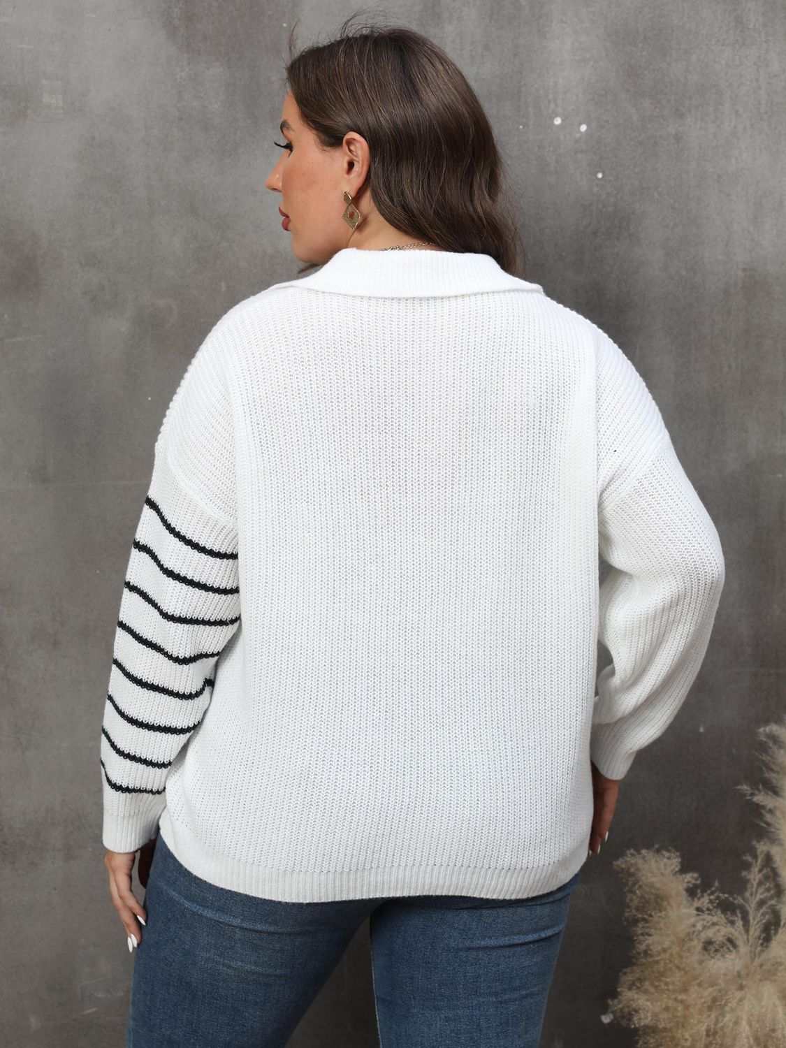 Plus size chic striped V-neck sweater with long sleeves.