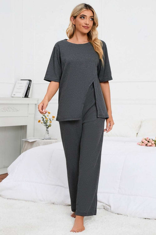 Woman wearing gray slit round neck top and pants lounge set.