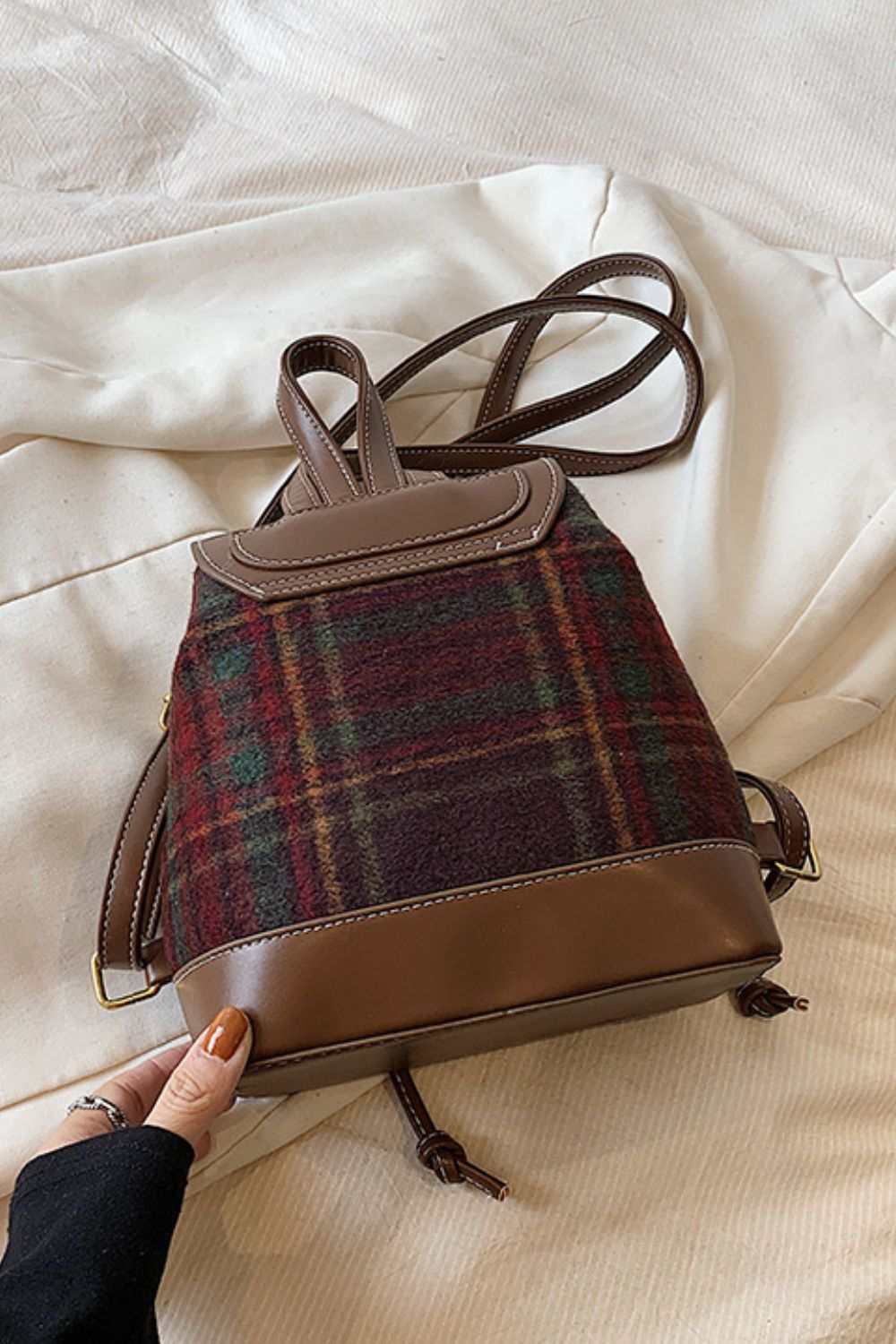 Small PU leather drawstring plaid backpack bag in brown and red.