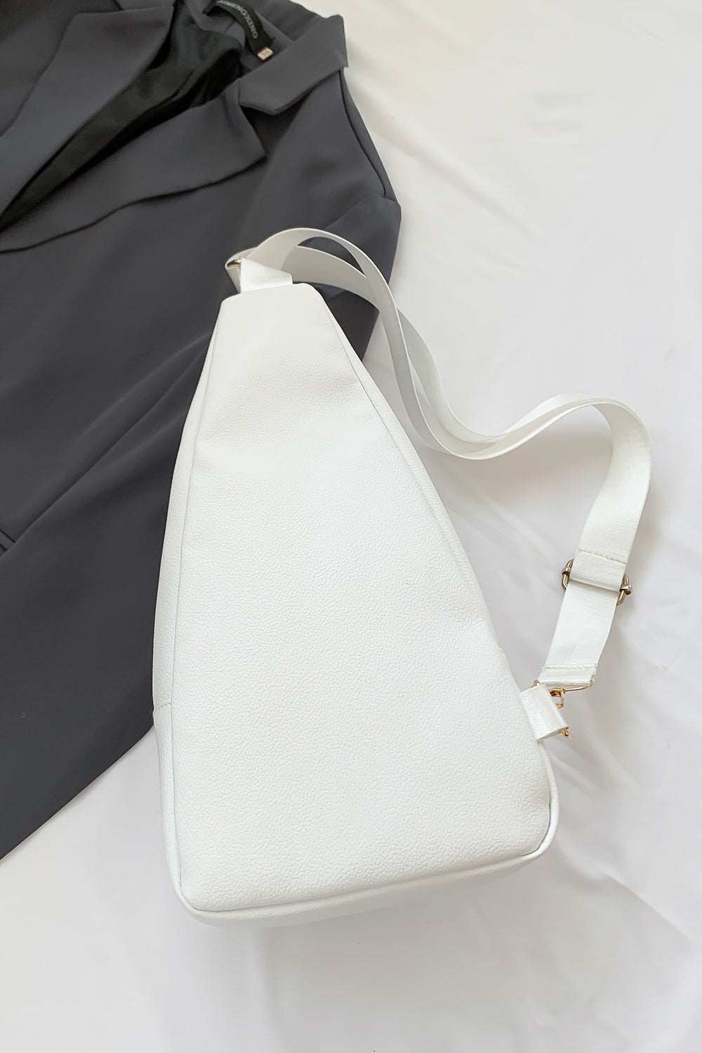 White PU Leather Sling Bag, medium size, imported, with a sleek design.