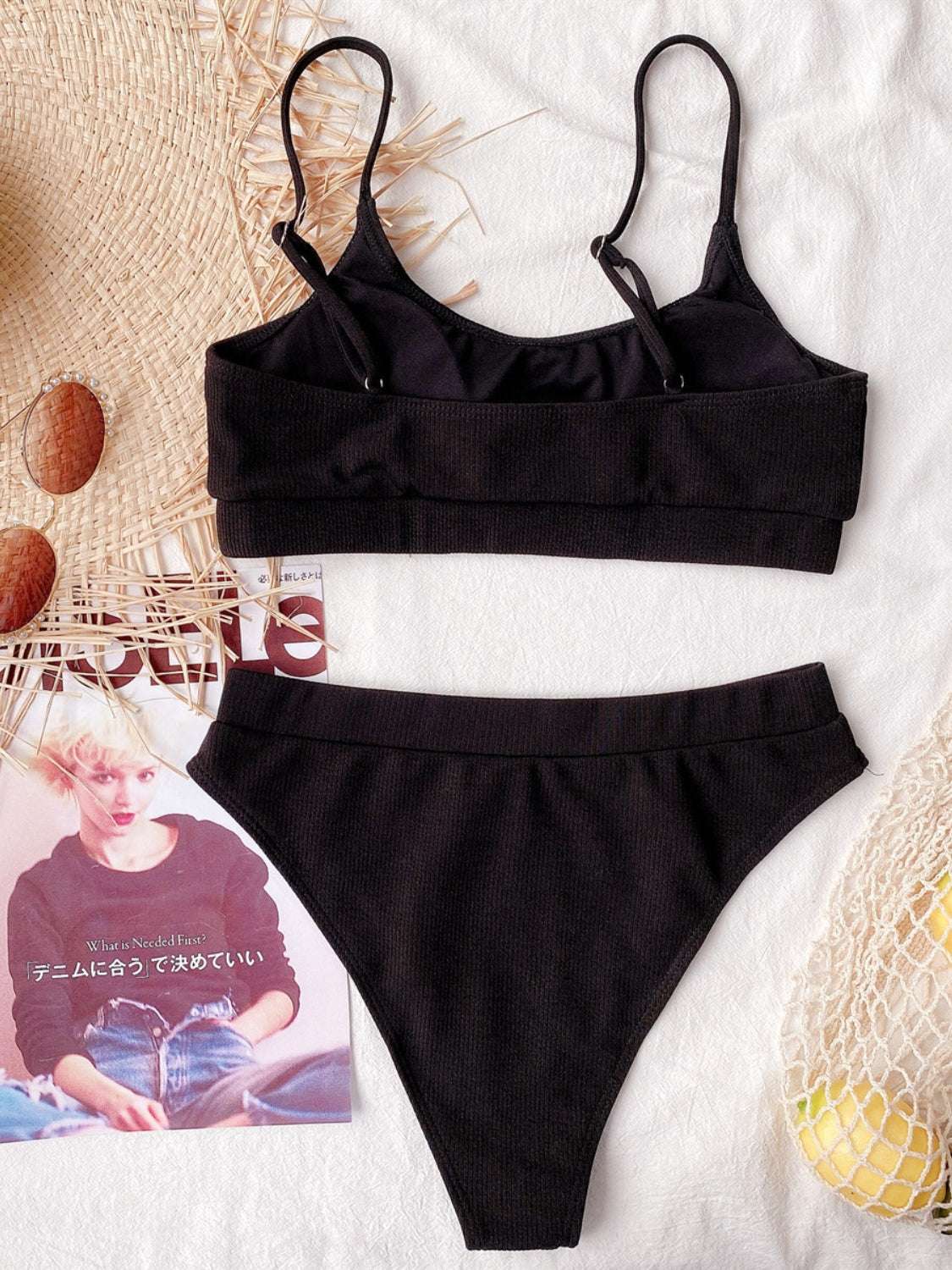 Scoop neck spaghetti strap two-piece swim set in black with removable padding.