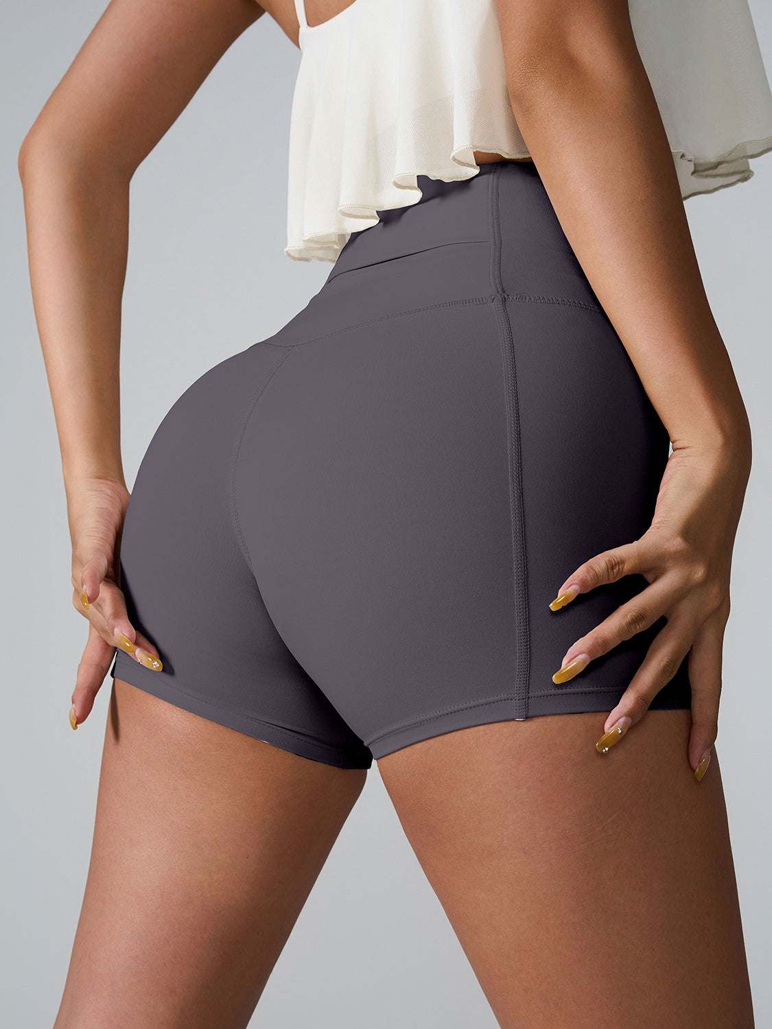 High waist active shorts with pockets, highly stretchy fabric.