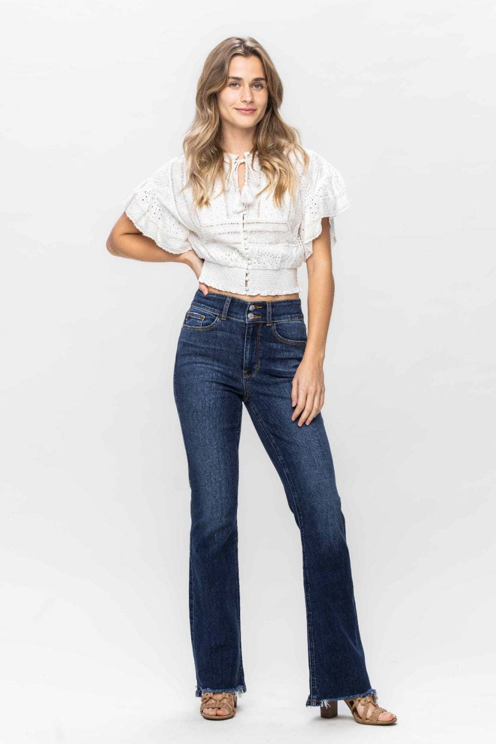 Judy Blue Full Size Frayed Hem Bootcut Jeans with trendy distressed finish.