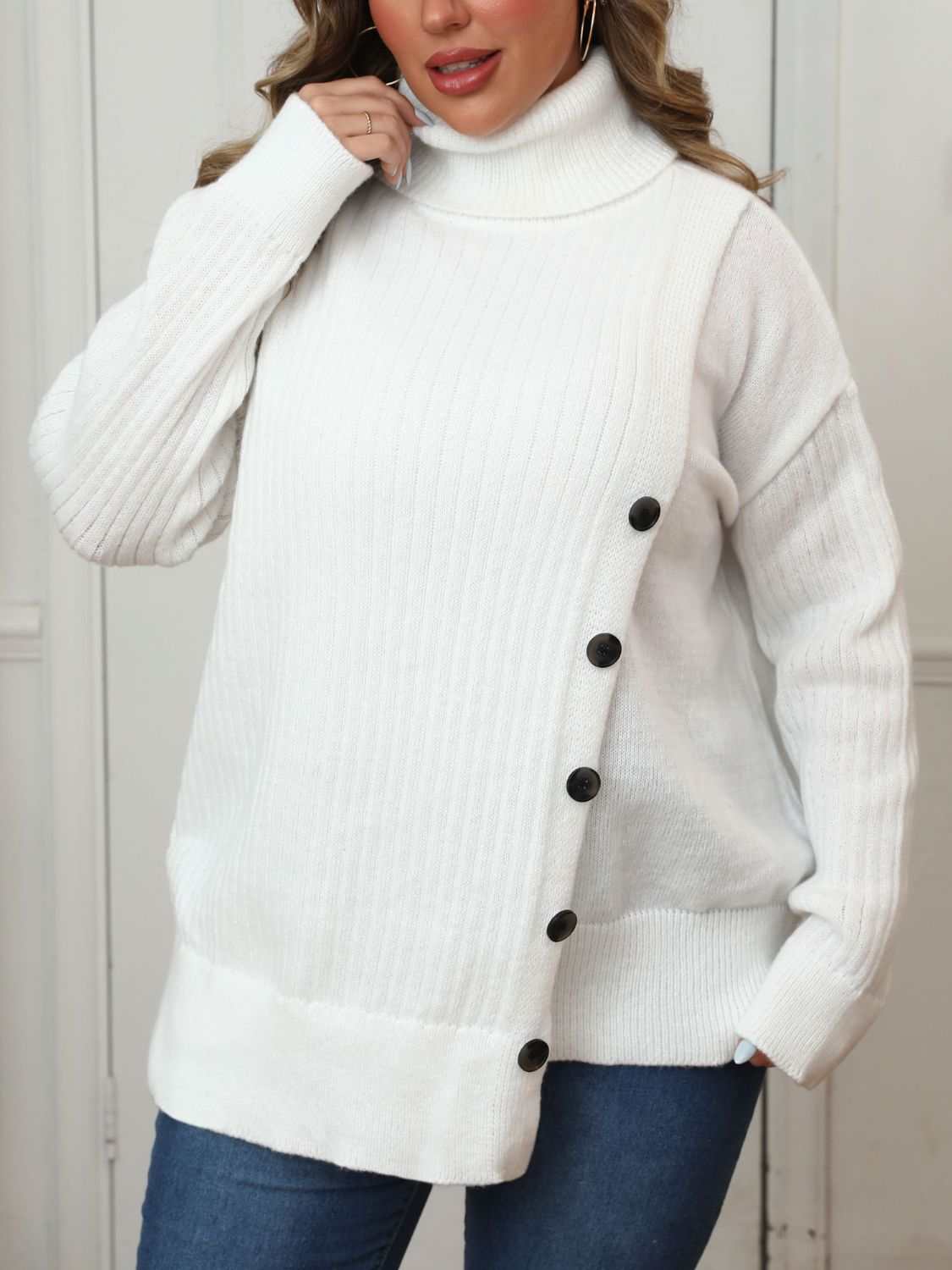 Plus size turtleneck long sleeve sweater with buttons and moderate stretch.