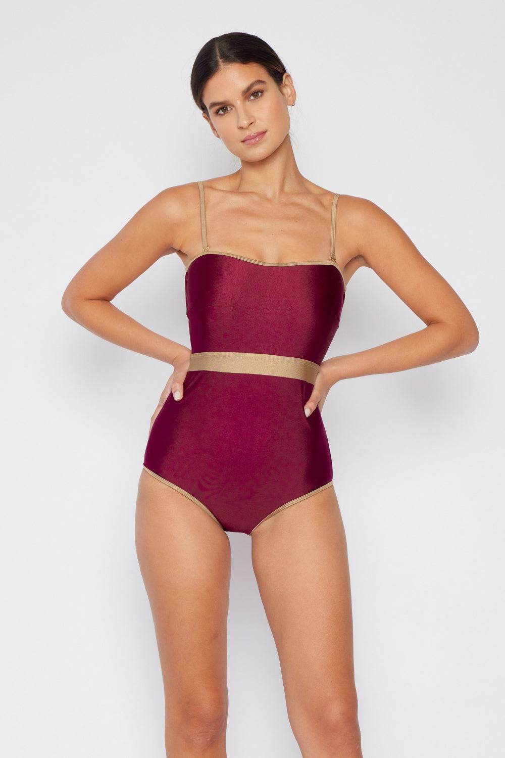 Marina West Swim Wave Break Contrast Trim One-Piece Swimsuit in Wine with Contrast Waistband and Open-Back Detail.