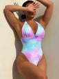 Tie-Dye Halter Neck One-Piece Swimsuit in pastel shades, featuring a stylish beach design with a halter neckline and removable padding.