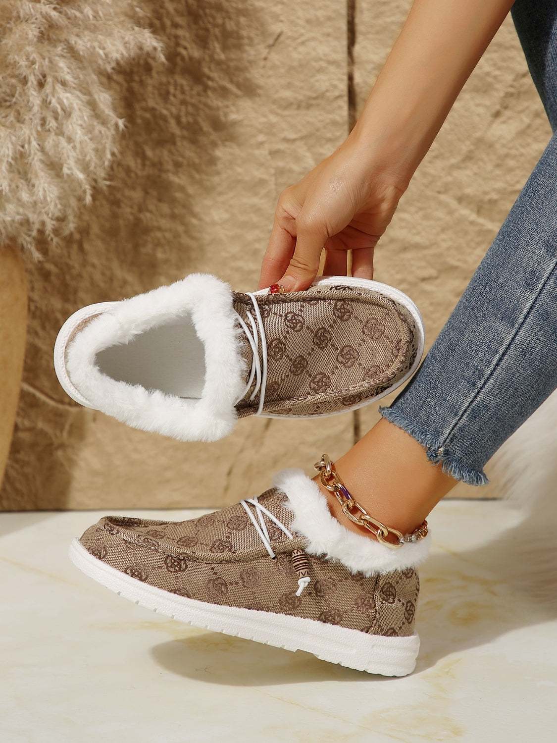 Printed round toe flat slip-ons with faux fur and cotton material, featuring a casual design and EVA sole.