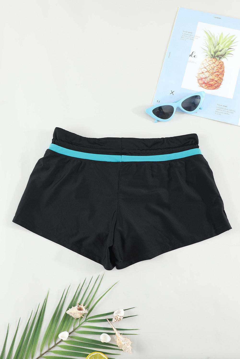 Full Size Drawstring Swim Shorts in black with turquoise stripe, stretchy nylon and spandex material.