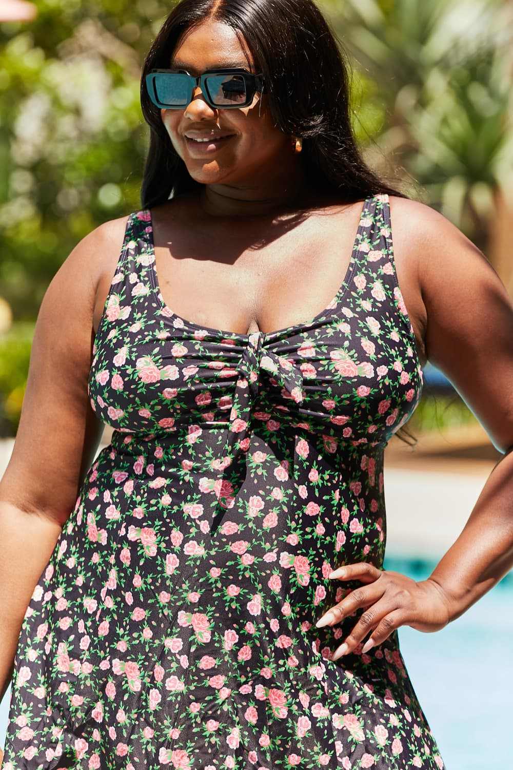 Plus-size swim dress in black floral print with scoop neck and built-in boyshorts, Marina West Swim.