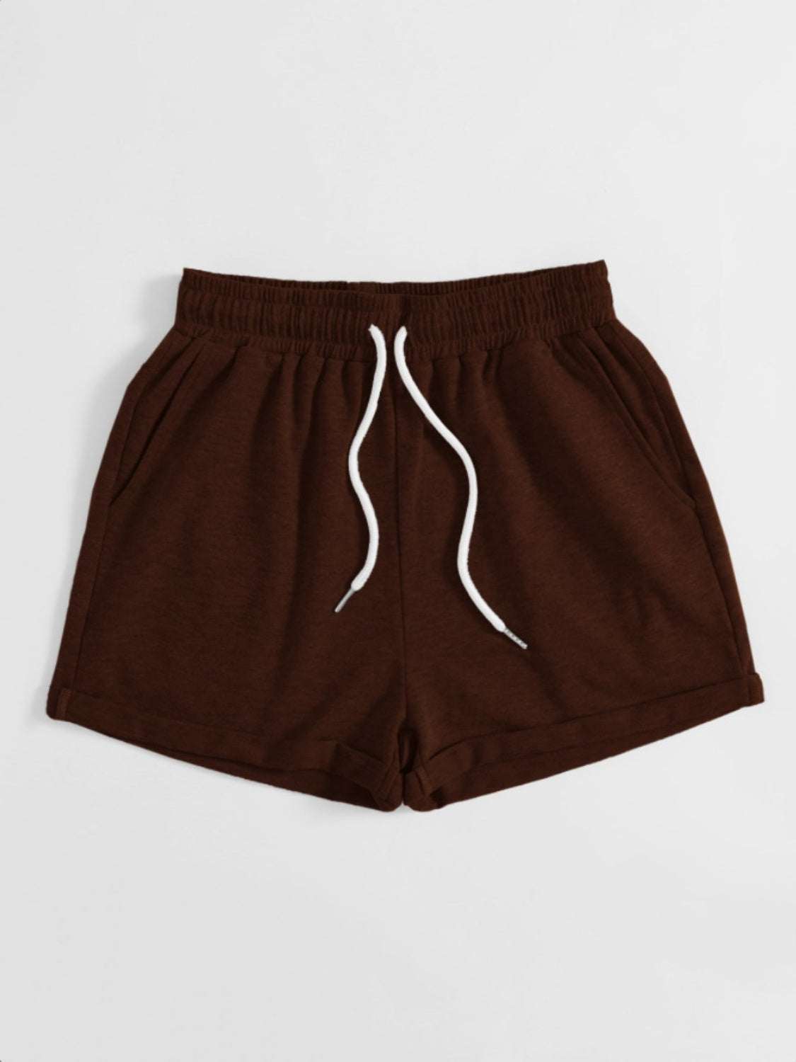 Drawstring pocketed elastic waist shorts in brown polyester.