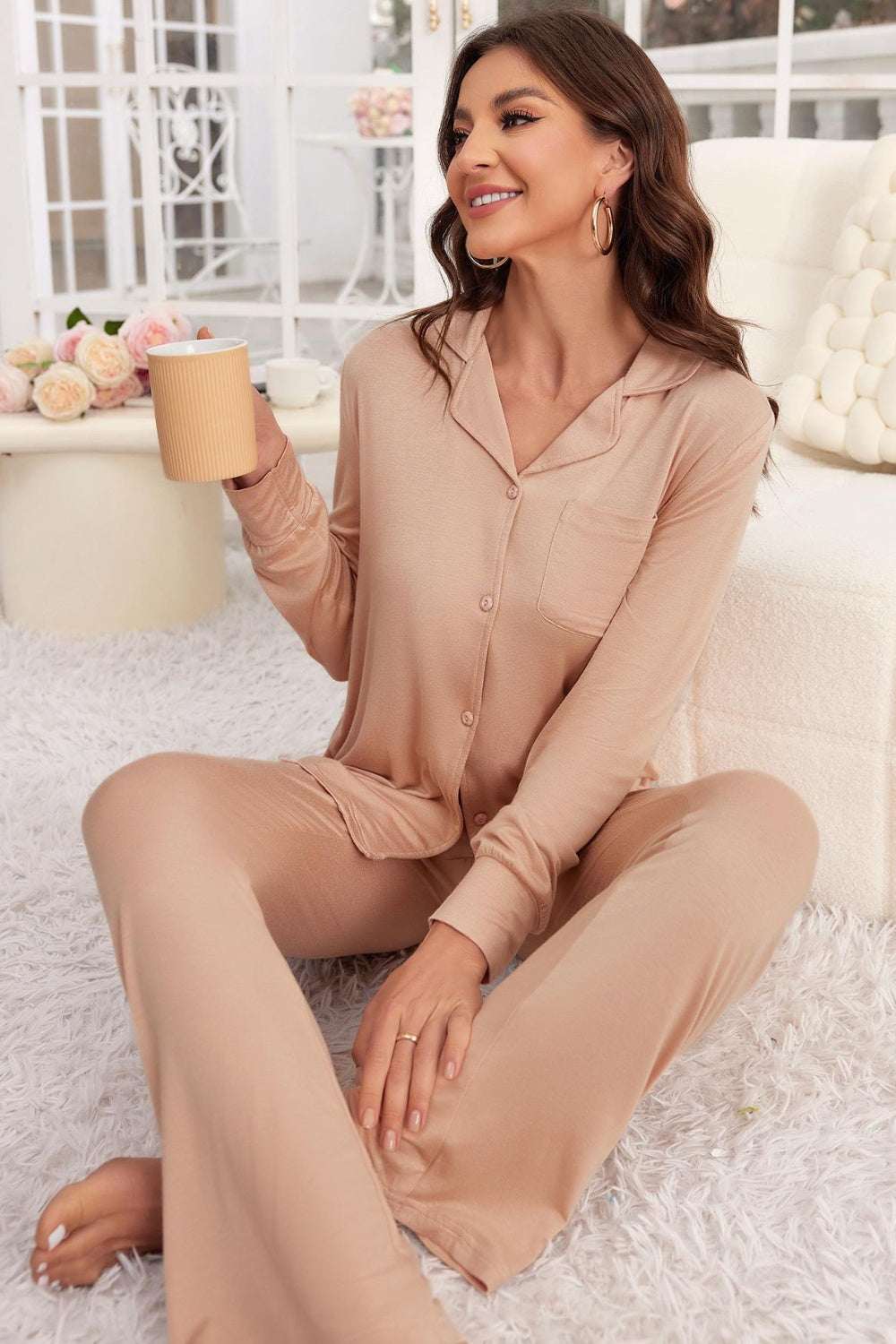 Button up long sleeve top and pants lounge set in beige, featuring a cozy fit, perfect for relaxing indoors.