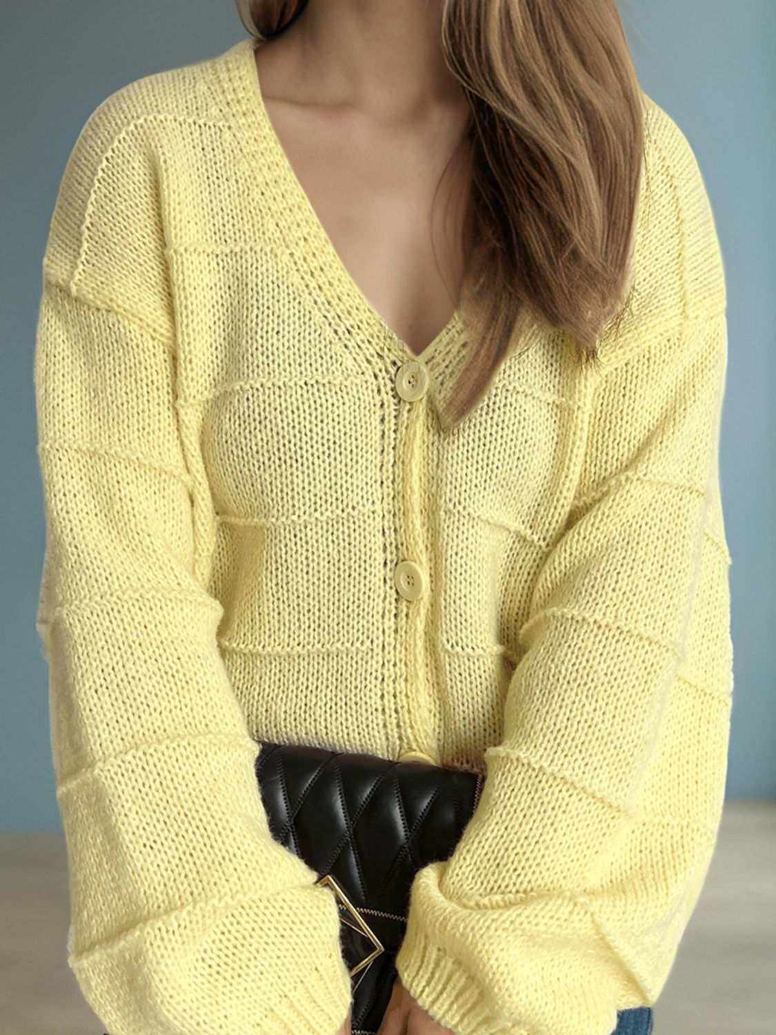 Button down V-neck long sleeve cardigan in yellow, slightly stretchy polyester and acrylic blend.