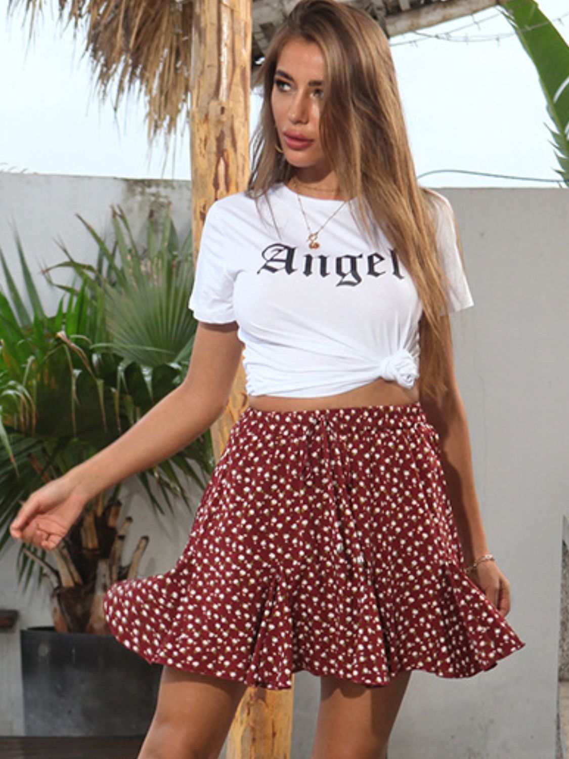 Perfee ANGEL Round Neck Short Sleeve T-Shirt, white, slightly stretchy, 95% cotton, worn with a red floral skirt.