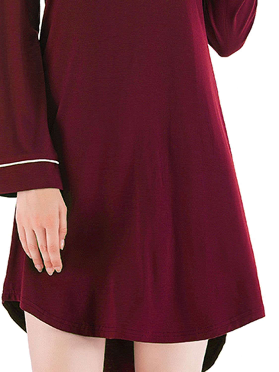 Round neck night dress with pocket in maroon color and long sleeves.