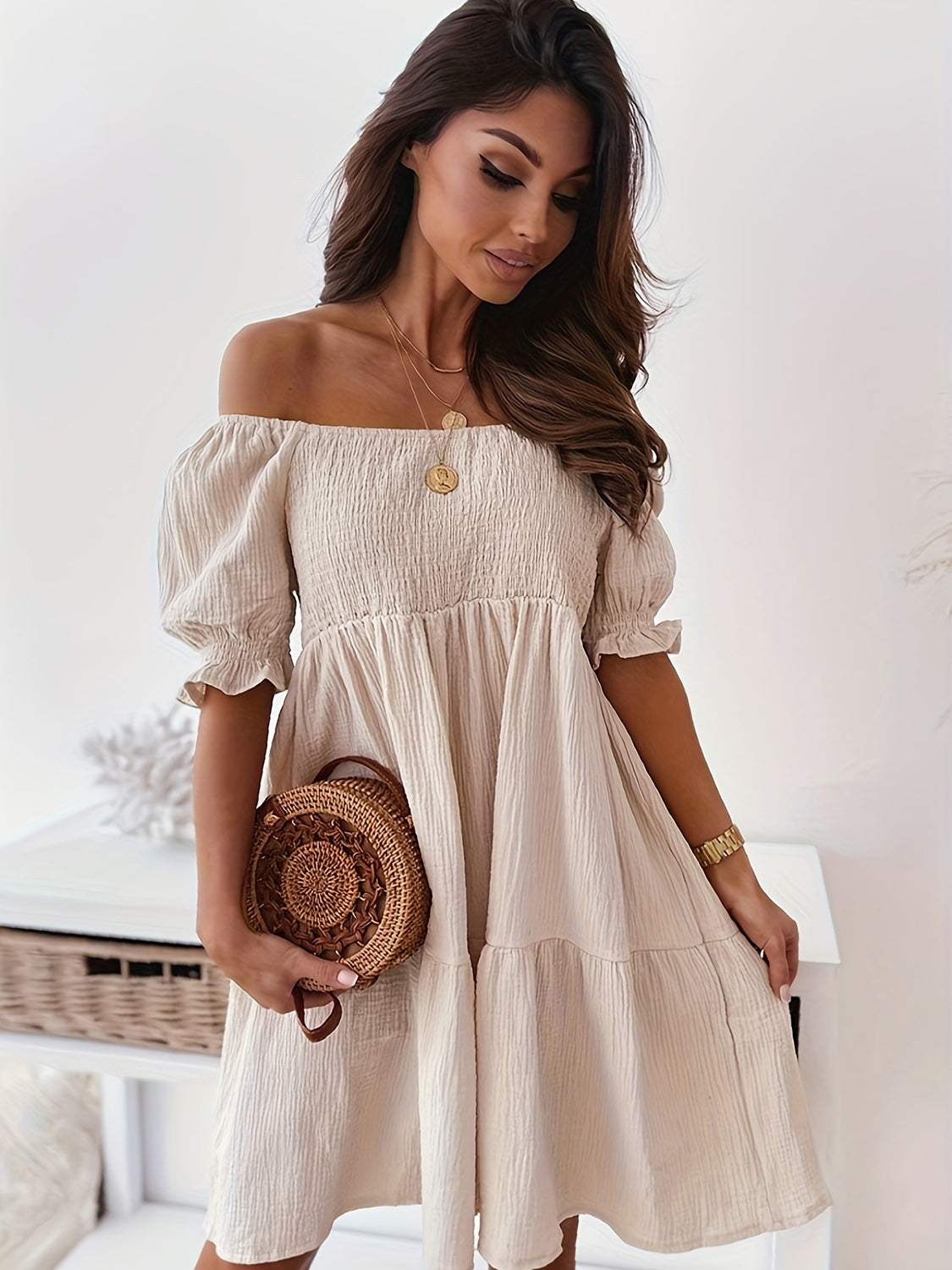 Full size ruffled off-shoulder short sleeve dress in beige, featuring ruched and ruffled design.