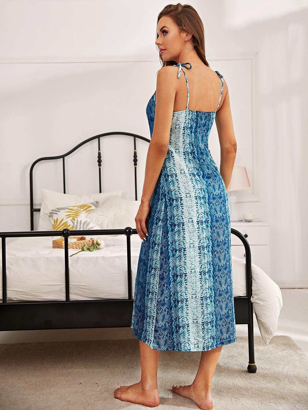 Floral printed tie shoulder midi night dress in blue with scoop neck, sleeveless design, and minimalist style.