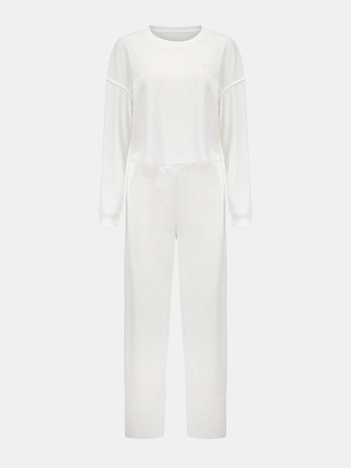 Waffle-knit round neck top and pants set in white.