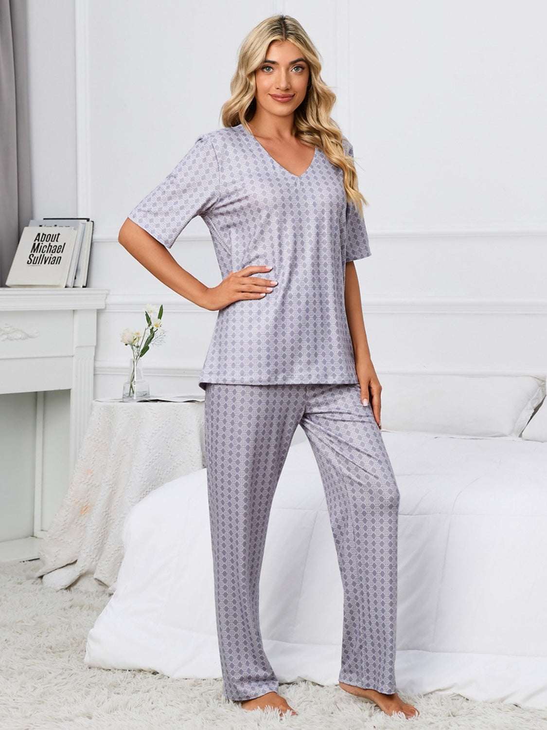 Printed V-Neck Top and Pants Lounge Set for women in gray with subtle pattern, made of 100% polyester.