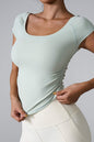 Round neck short sleeve active t-shirt in light color, highly stretchy nylon and spandex blend.