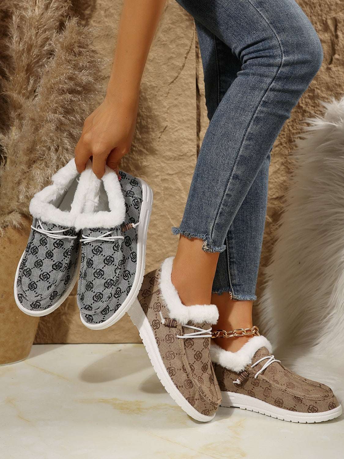 Printed round toe flat slip-ons with faux fur and cotton material, shown in two colors.