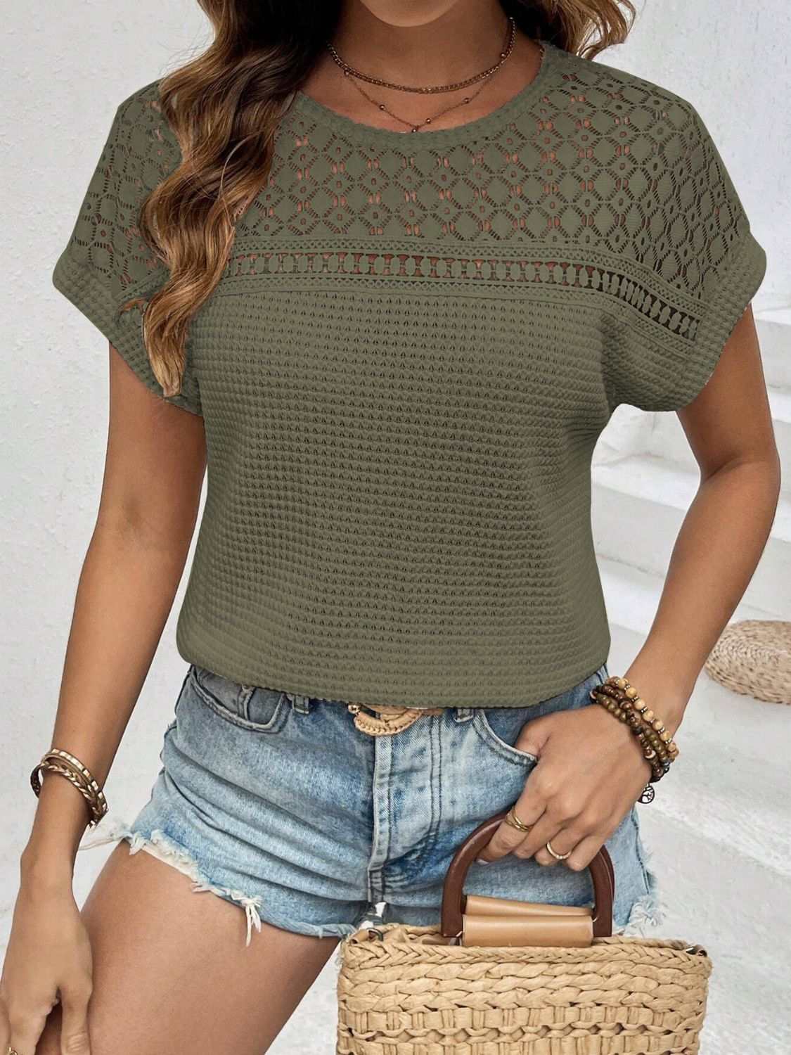 Waffle-knit round neck short sleeve top with lace detail, semi-sheer, in olive green.