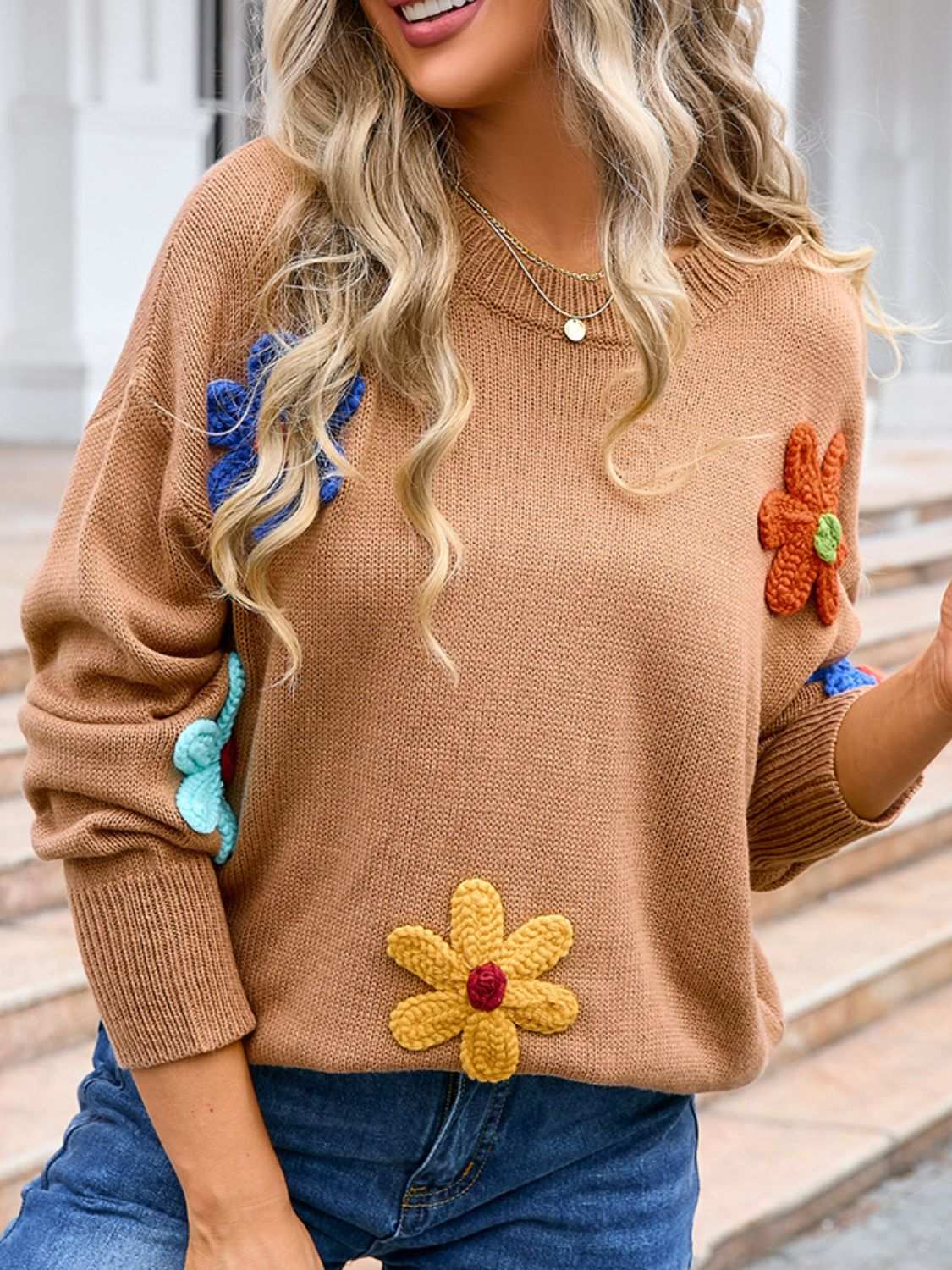 Angel Wings Crochet Flower Round Neck Sweater with vibrant floral details and moderate stretch.