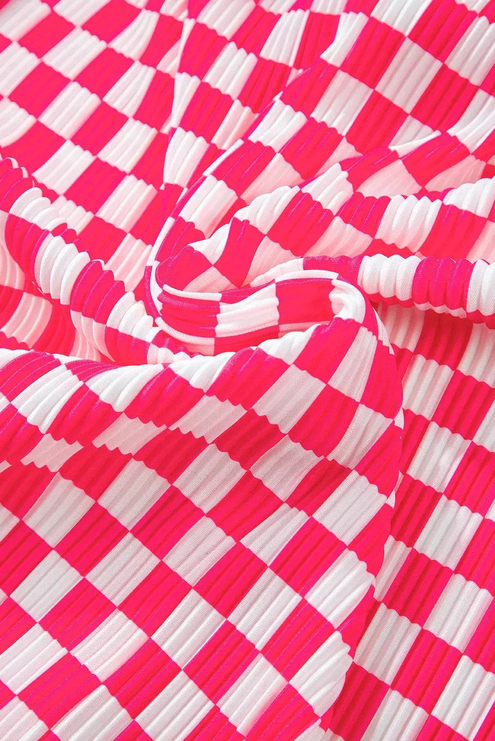 Red and white checkered fabric of pants lounge set in polyester.