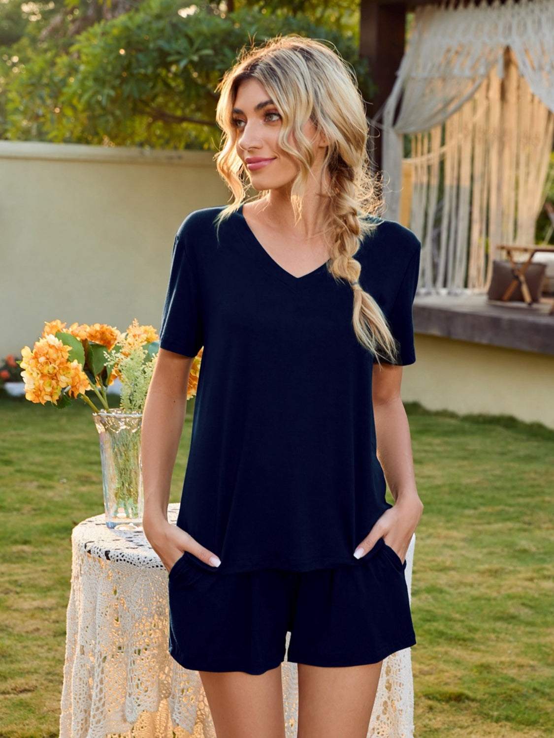 V-Neck short sleeve top and pocketed shorts lounge set in navy blue.