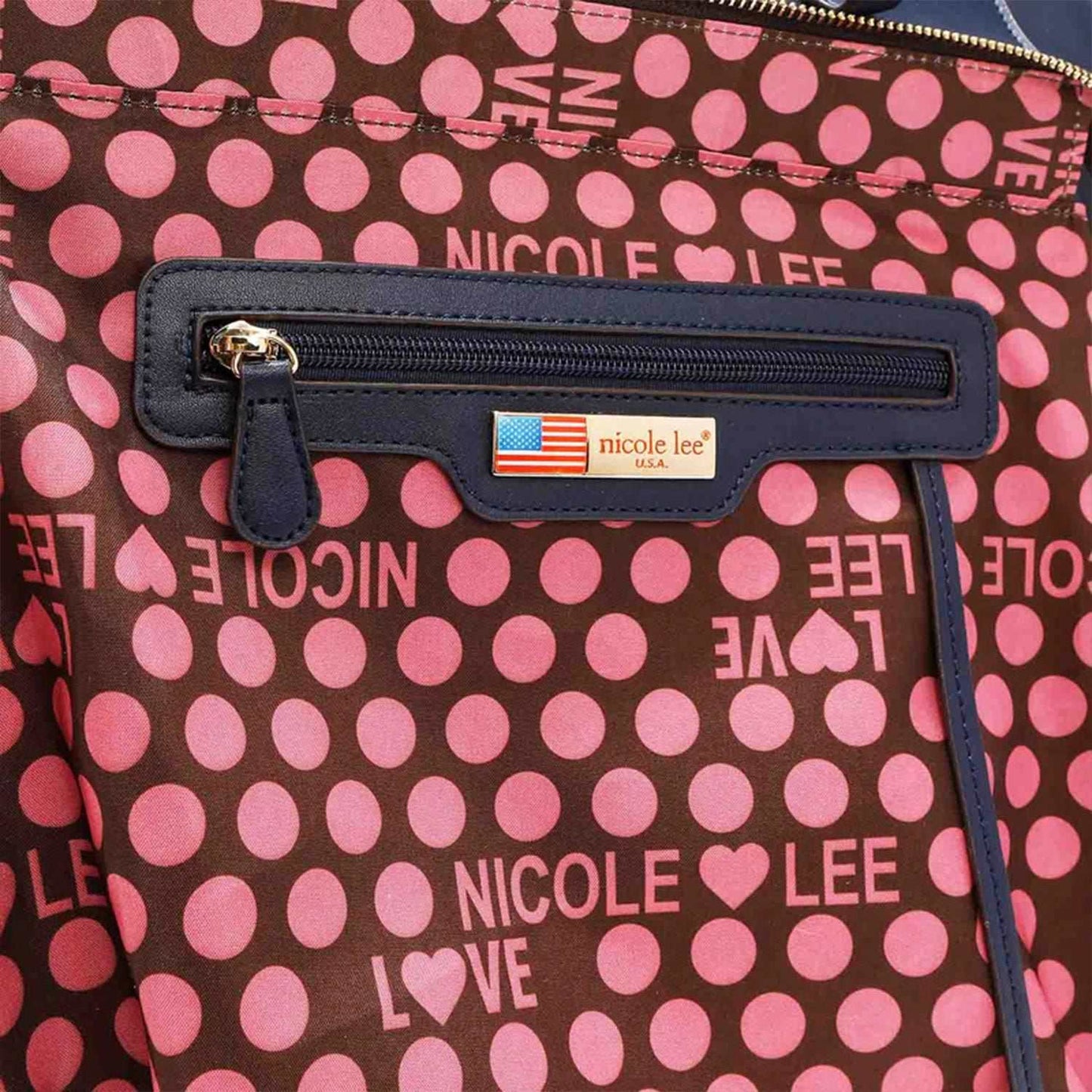 Nicole Lee USA 3-Piece Color Block Handbag Set featuring inner pouch detail with brand logo and pink polka dot pattern.