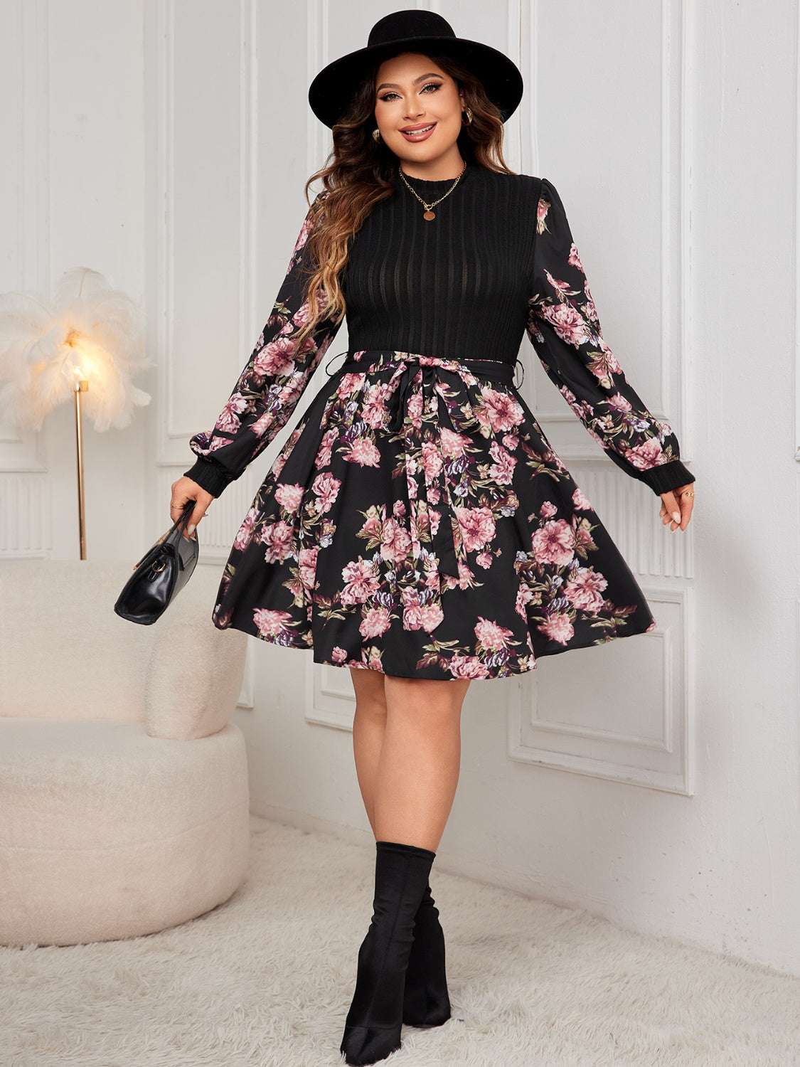 Plus size tied printed long sleeve dress in floral design.