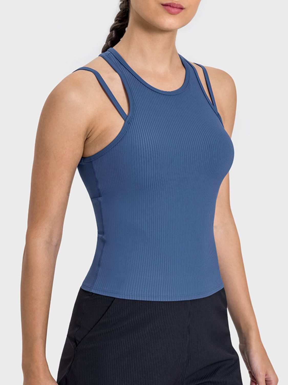 Millennia Cutout Round Neck Racerback Active Tank in blue, showcasing a sleek, fitted design with moderate stretch.