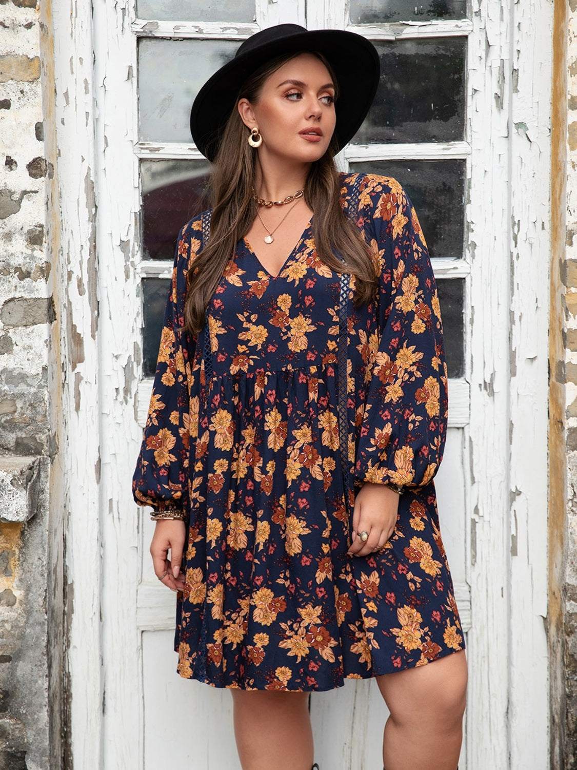 Plus Size Floral V-Neck Balloon Sleeve Dress in blue with yellow flowers, non-stretch viscose material.