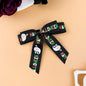 2-Piece Polyester Bow Hair Clip with Halloween design, 4.3x3.9 inches, 1 oz.