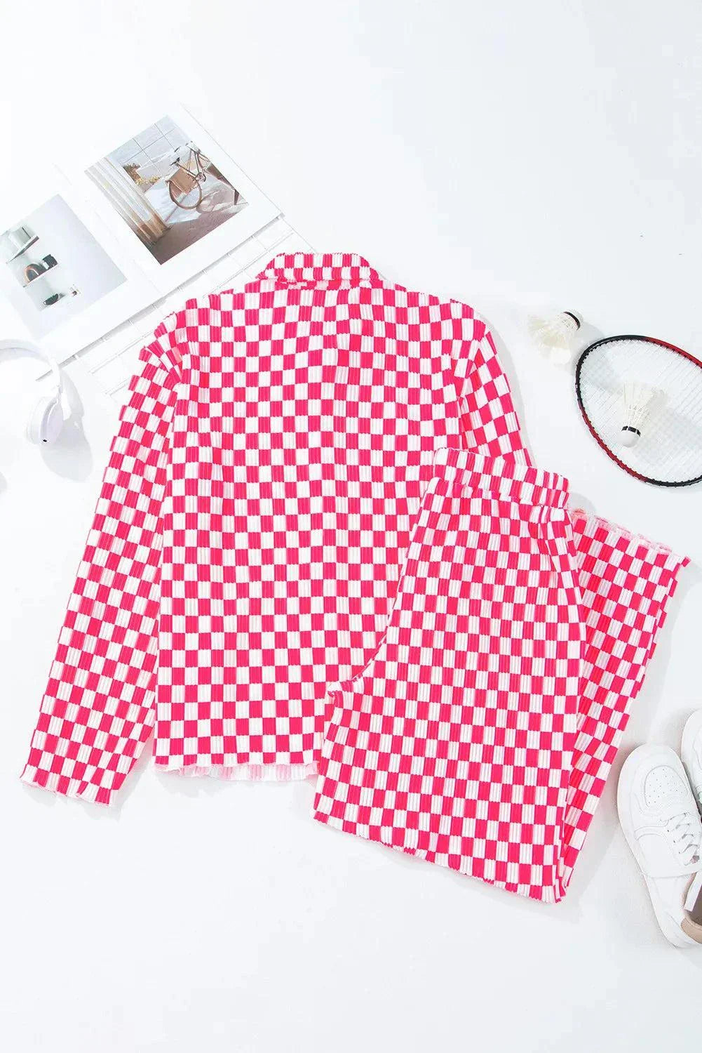 Checkered button-up top and pants lounge set in red and white, made of 100% polyester.