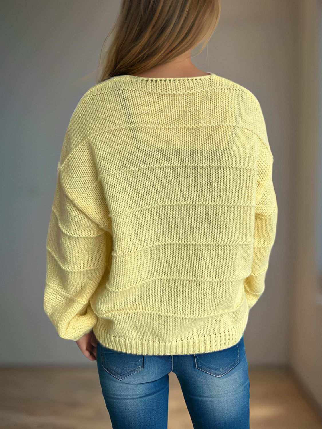 Button Down V-Neck Long Sleeve Cardigan in light yellow, slightly stretchy knit, back view.