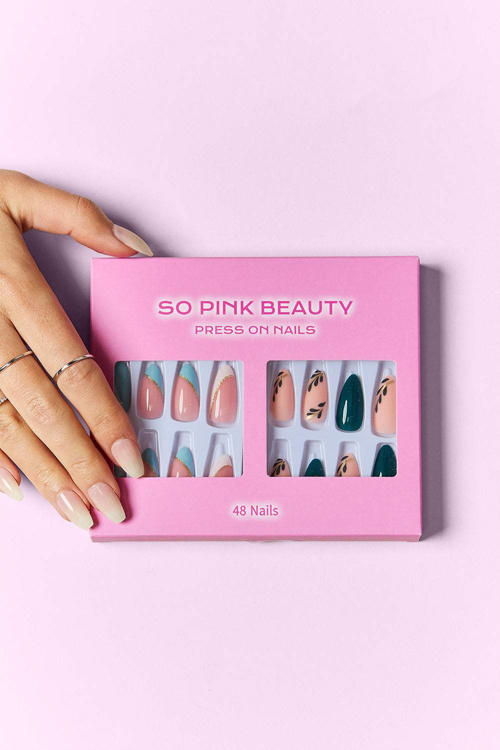 SO PINK BEAUTY Press On Nails 2 Packs with 48 pieces and two versatile designs shown in pink packaging.