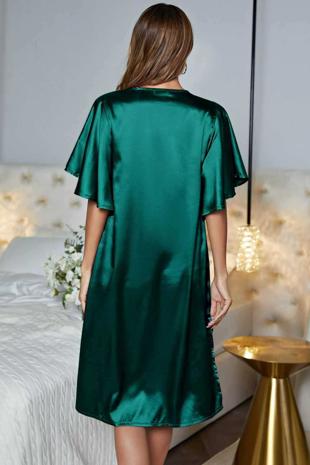 Satin night dress with flutter sleeves and side slit, featuring a V-neck design.