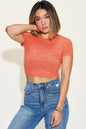 Basic Bae full size ribbed round neck short sleeve t-shirt in orange.