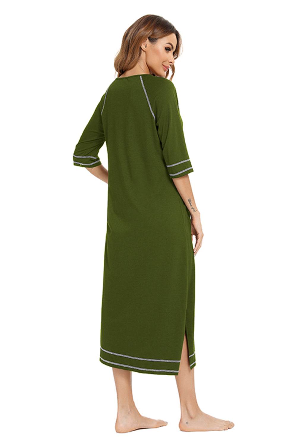 Green zip-up slit round neck night dress with pockets and a slightly stretchy material, shown from the back.