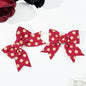 2-Piece Polka Dot Bow Hair Clips in red with white dots, polyester material.