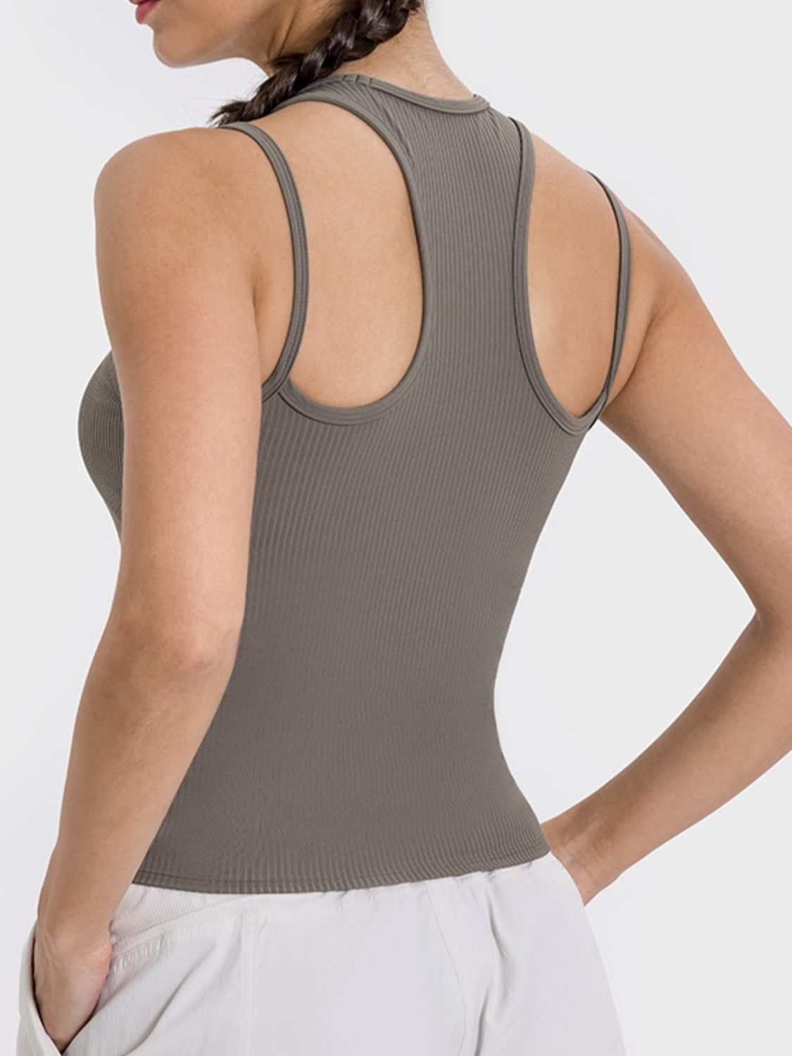 Millennia Cutout Round Neck Racerback Active Tank in opaque nylon-spandex blend, back view.