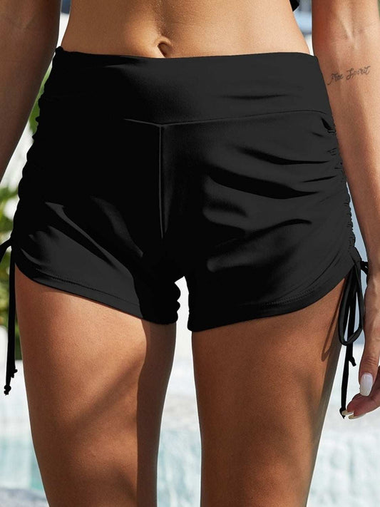 FAM-FAM Drawstring Mid-Rise Waist Swim Shorts, black, slightly stretchy, polyester-spandex blend.