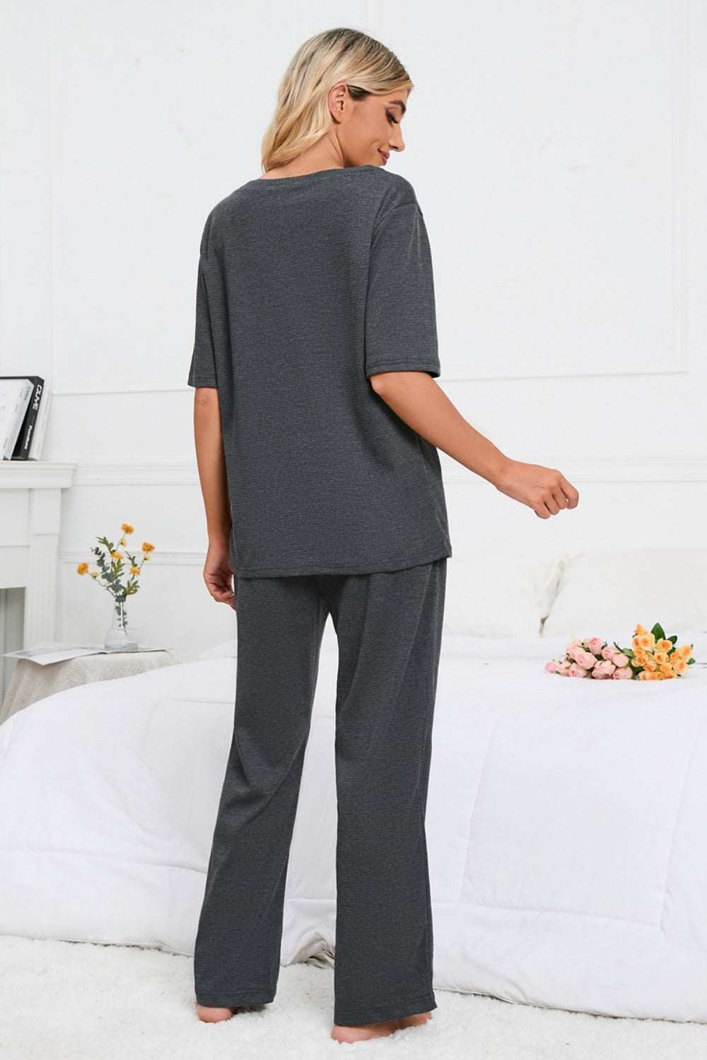 Slit round neck top and pants lounge set in dark color, back view